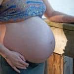 pregnant woman by water