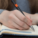 mom writing in journal