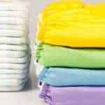cloth and disposable baby diapers in stacks