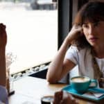 couple talking at coffee shop