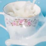 milk overflowing in teacup