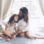 mom preparing older sibling for baby