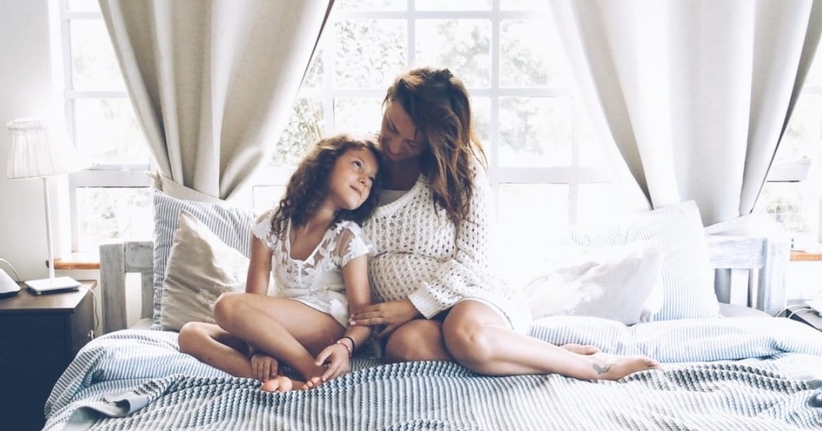 mom preparing older sibling for baby
