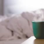 cup of hot tea by bedside