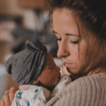 new mom holding baby
