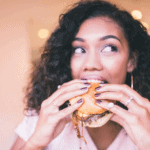 hungry mom eating burger