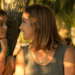 mom and older child in nature
