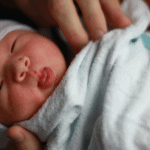 assessing newborn baby for tongue tie