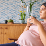 pregnant mom thinking in chair