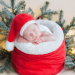 Newborn baby in a Santa hat