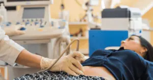 Your Prenatal Care, A woman gets an ultrasound in early pregnancy
