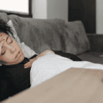 Mom laying down with morning sickness