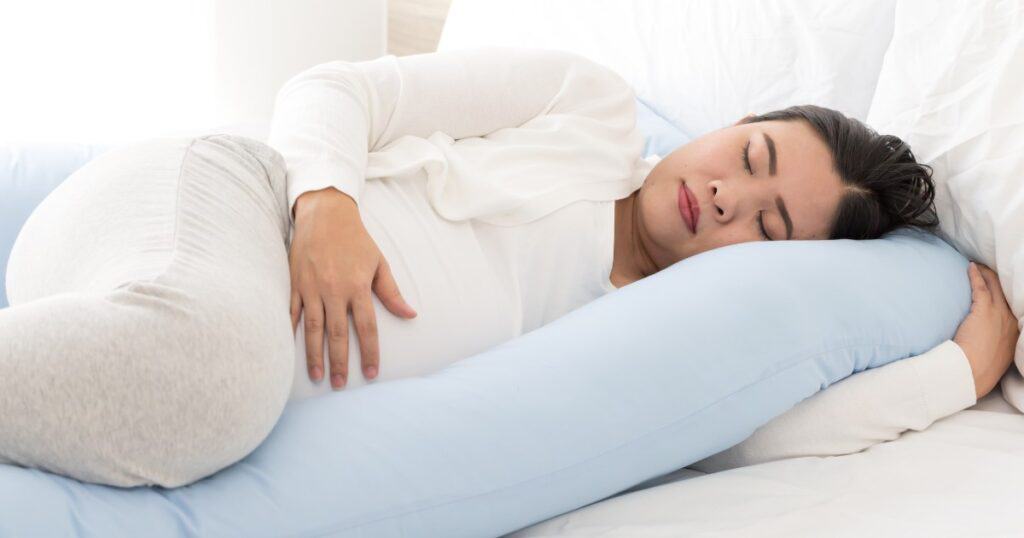 Pregnant Mom side-lying in bed