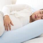 Pregnant Mom side-lying in bed