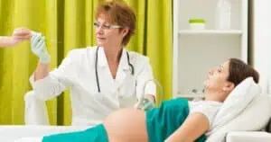doctor performs amniocentesis