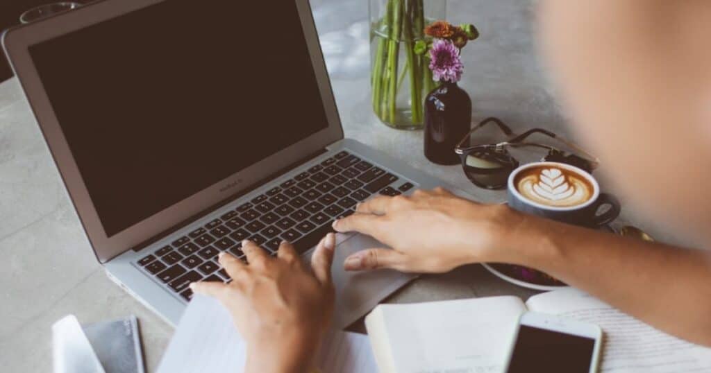 woman searching the internet on laptop