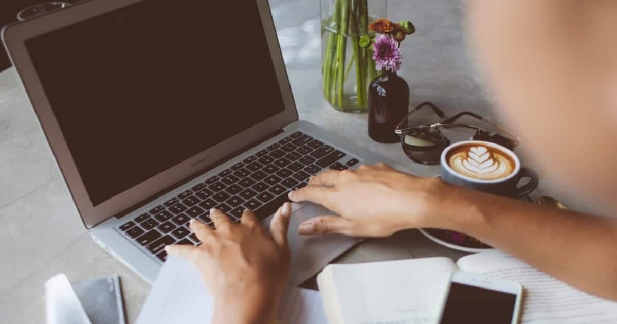 woman searching the internet on laptop