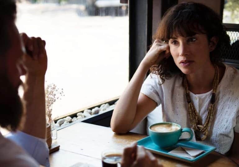 couple talking at coffee shop