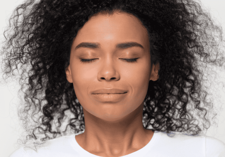 breathing techniques for labor, woman taking a breath