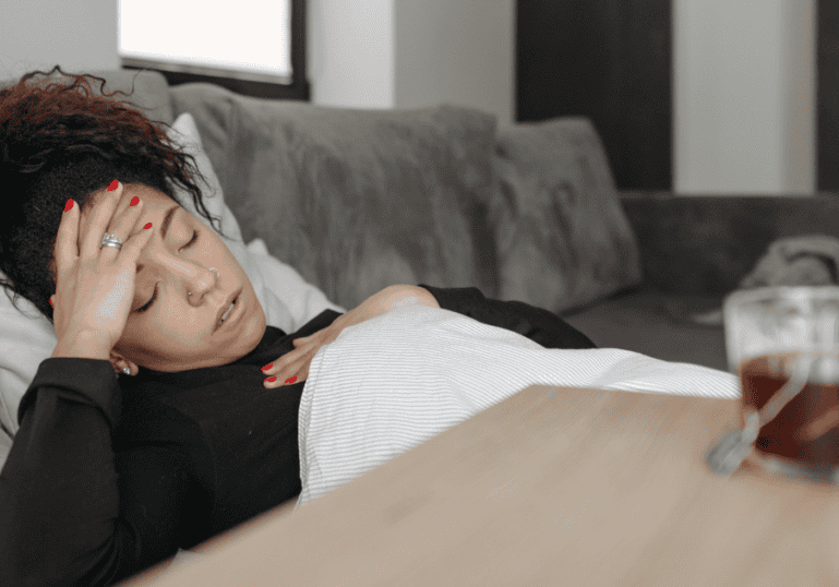 Mom laying down with morning sickness