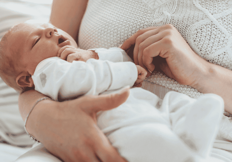 Mom holding baby