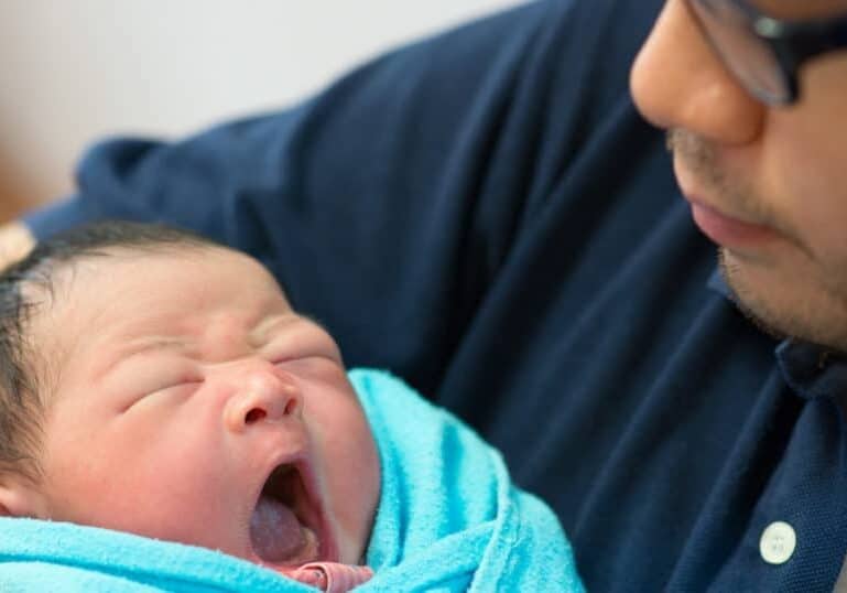Tampa dad with baby after VBAC
