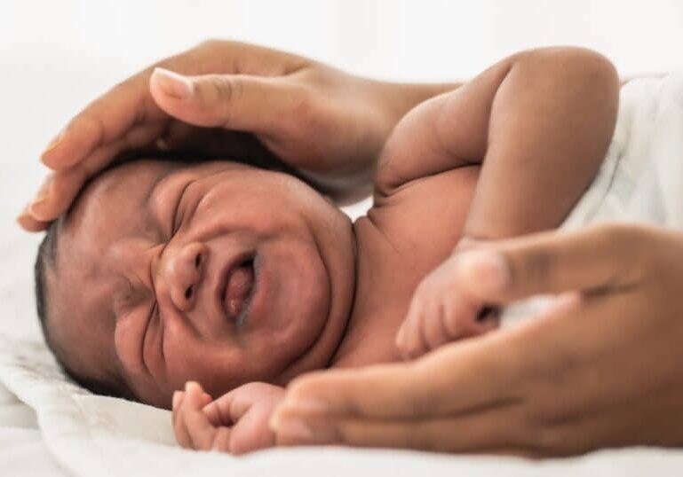 newborn crying with gas