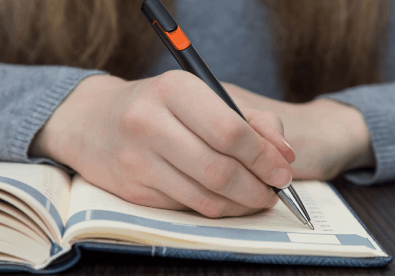 mom writing in journal