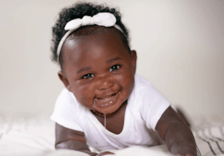 teething baby with drool