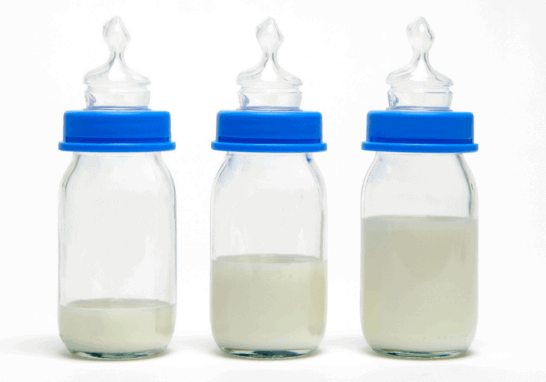 3 baby bottles of formula or breastmilk