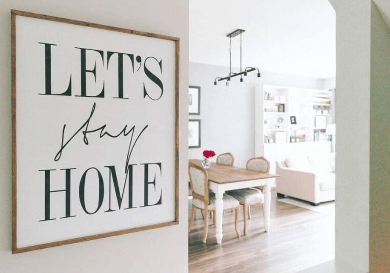 Home space with 'let's stay home' sign