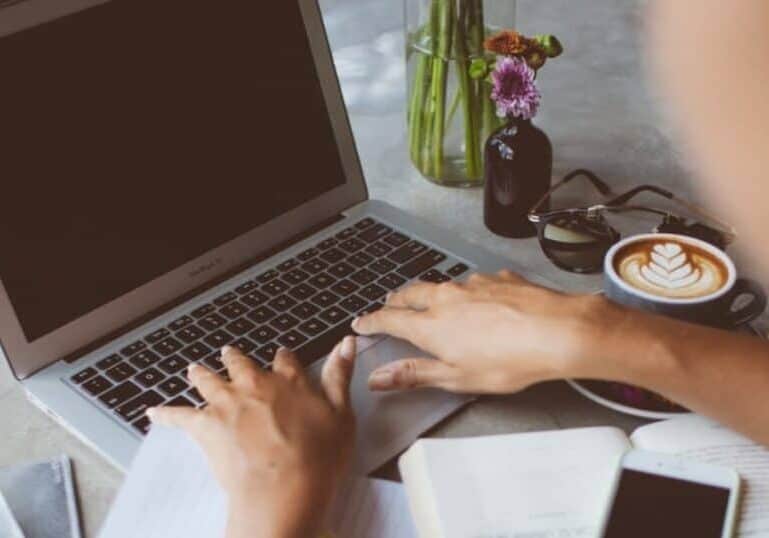 woman searching the internet on laptop